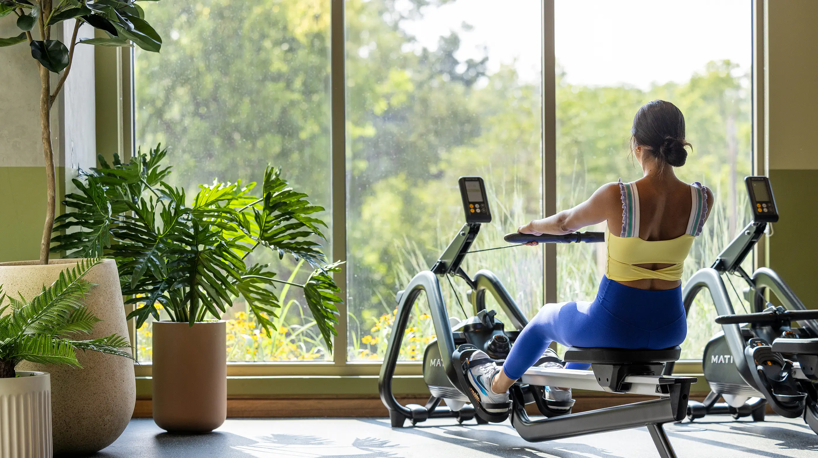 a resident working out in the fitness center