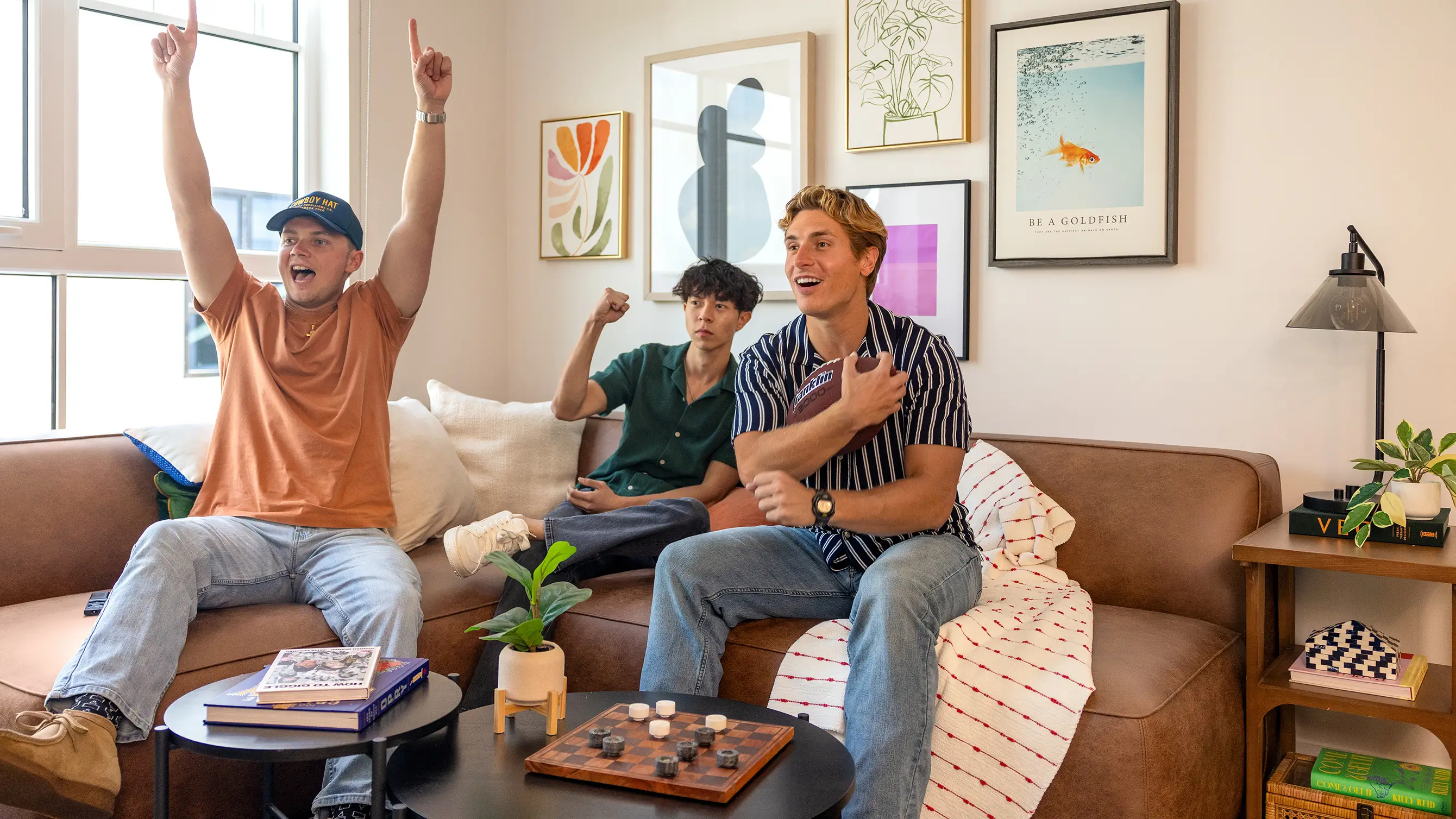 residents cheering in their living room