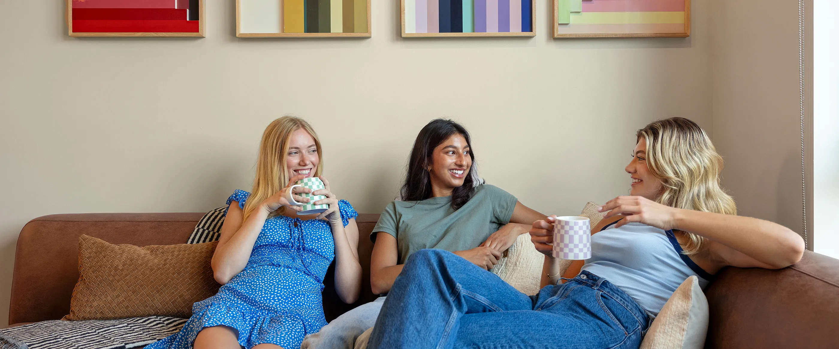 a group of friends sitting in a living room