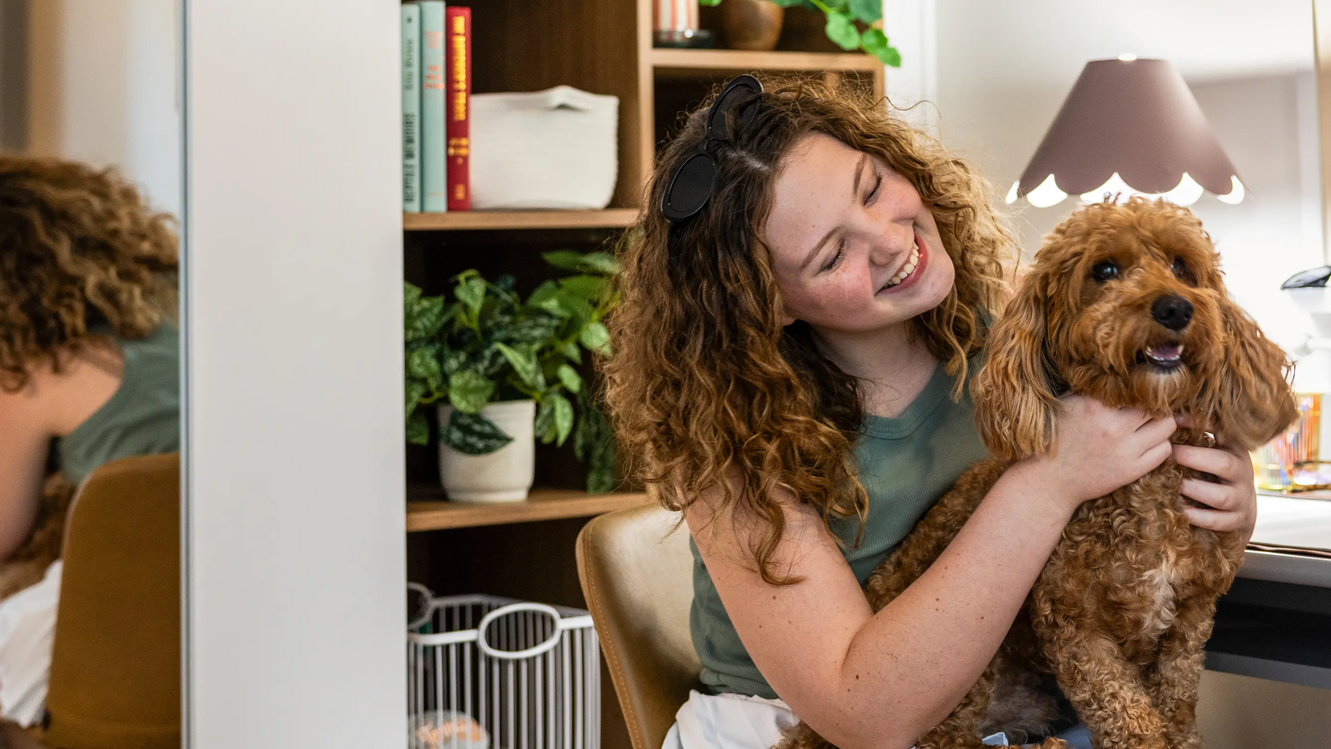 young woman and a small dog