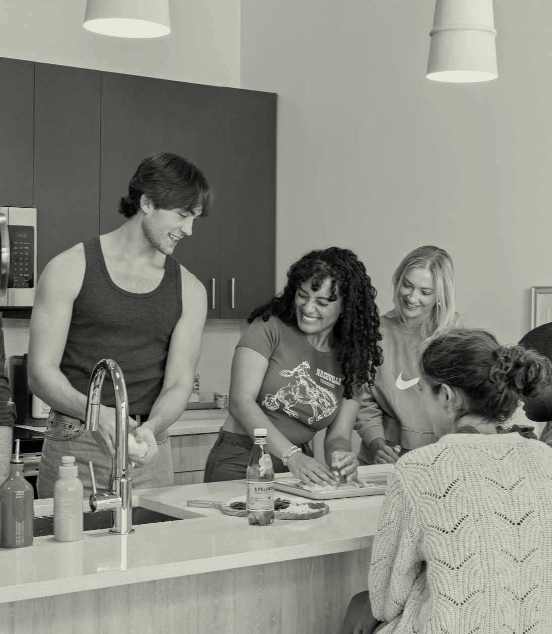 Friends cooking in a kitchen