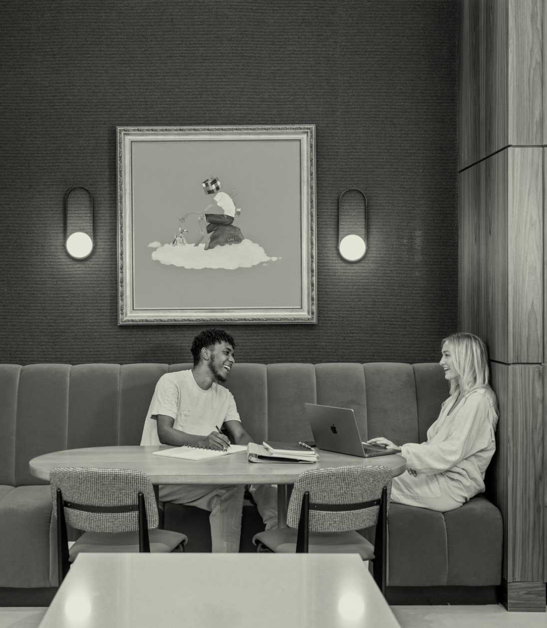 Friends studying in a booth