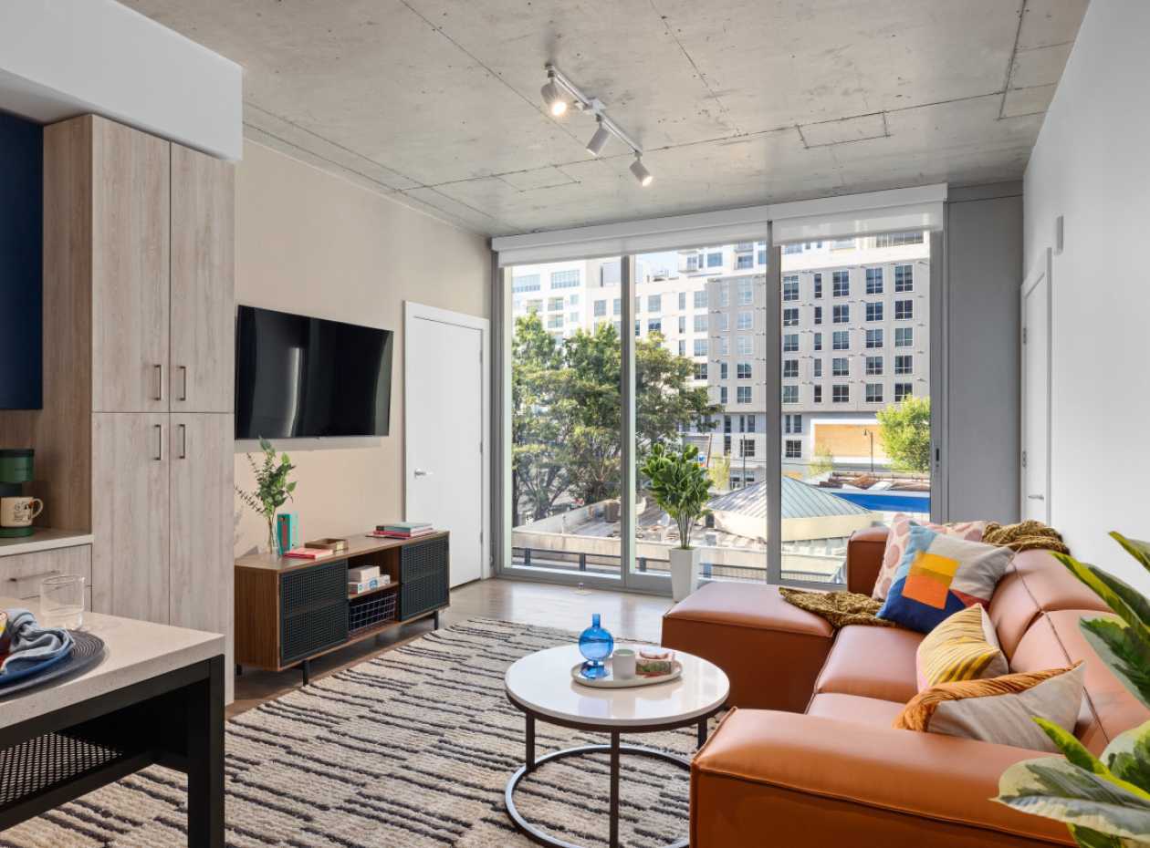 A living room with a TV