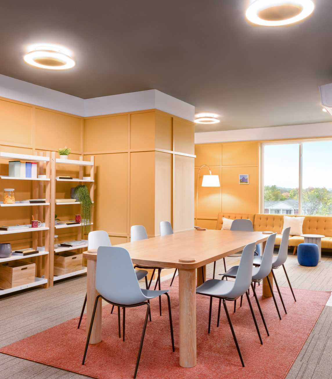 Bright study room with a table and chairs