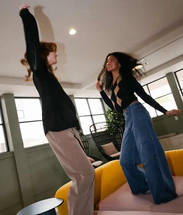 two young women dancing