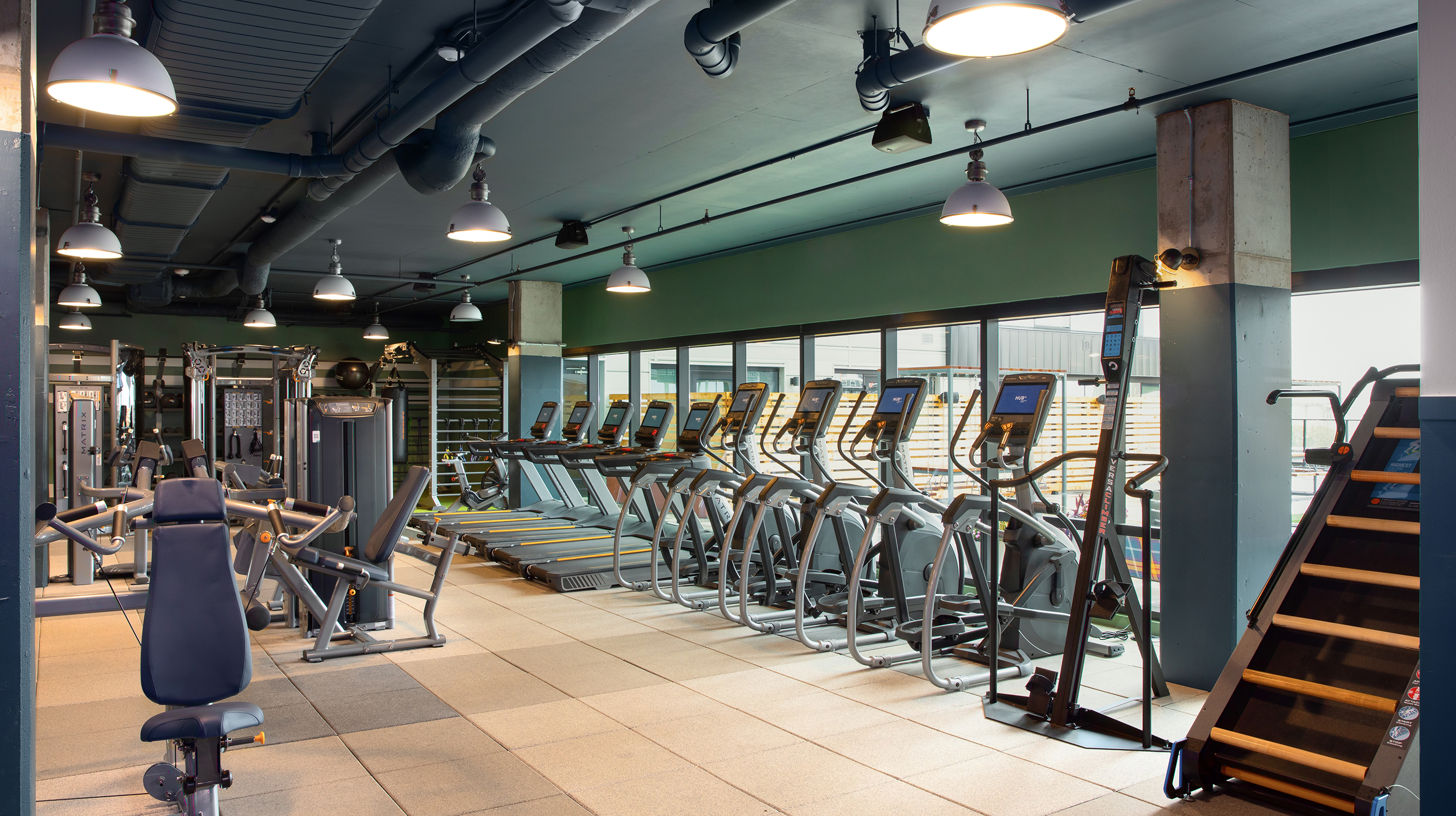 A fitness center with cardio equipment