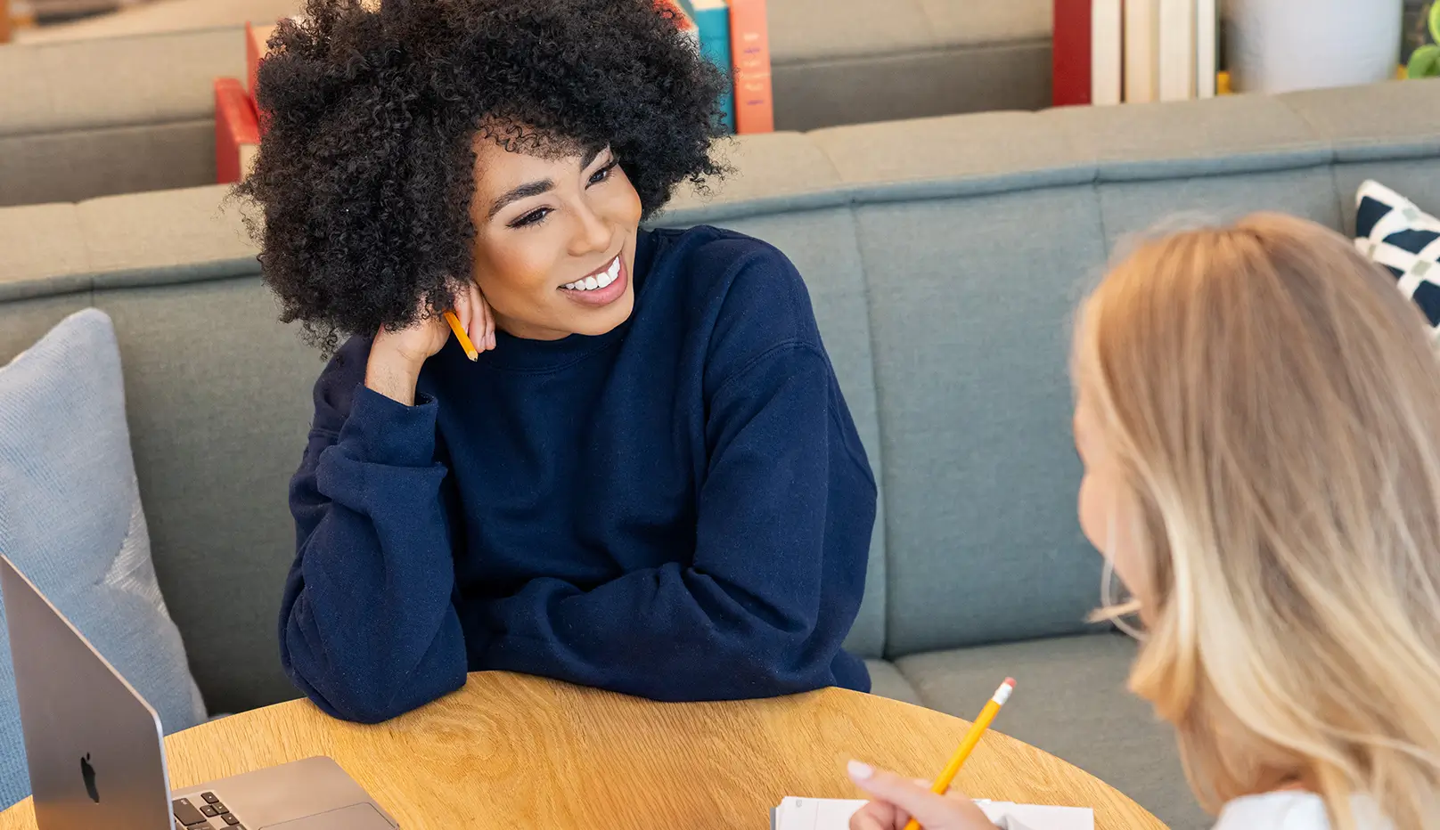 two women studying together