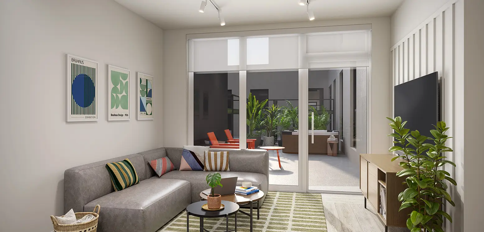 a living room with a balcony and a hot tub