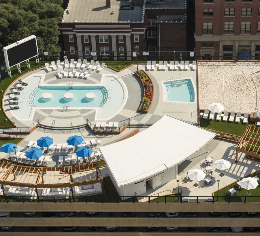 Aerial view of a swimming pool and chairs