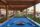 Outdoor hammocks and a billiard table