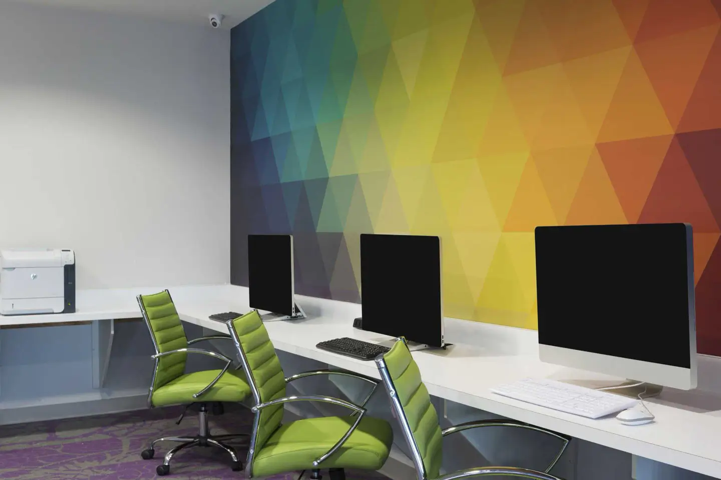 a computer lab with a printer