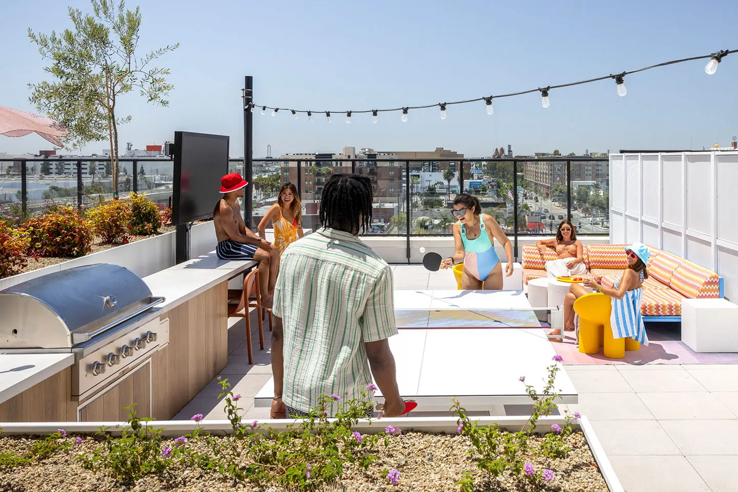 young adults playing table tennis