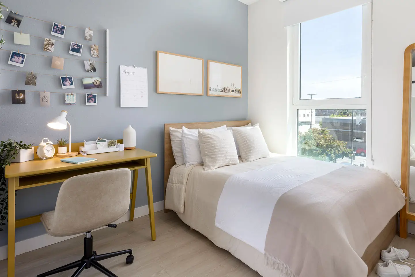 furnished apartment bedroom with study desk