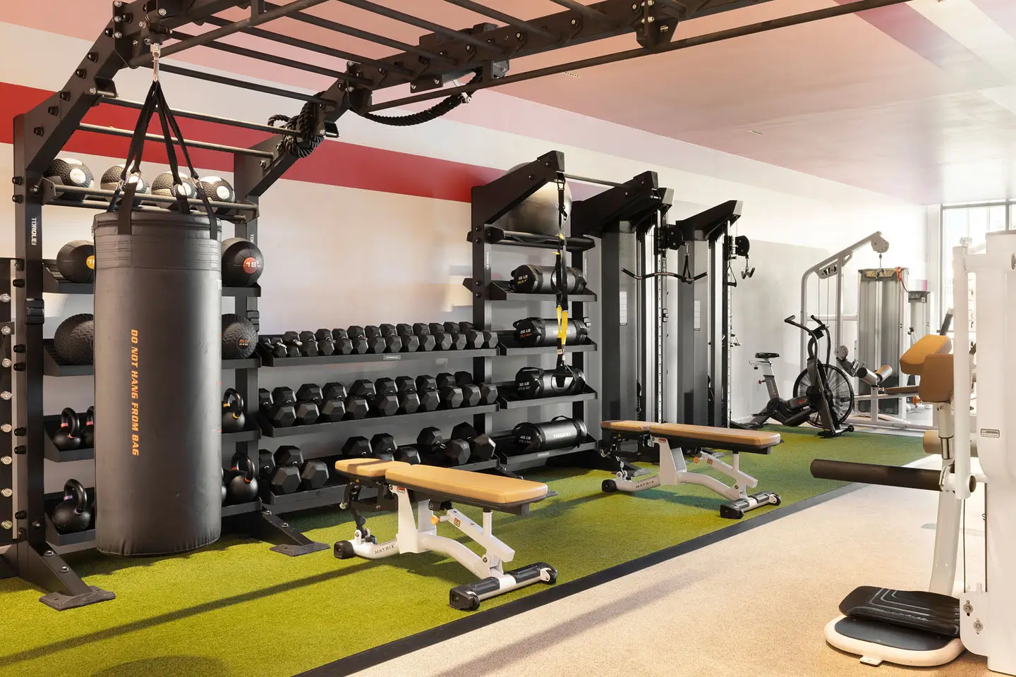 fitness center with free weights and exercise equipment