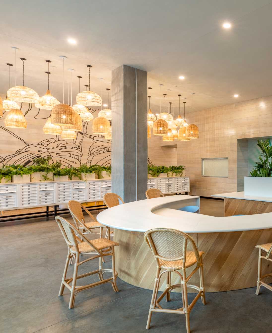 Common area with a white island and chairs