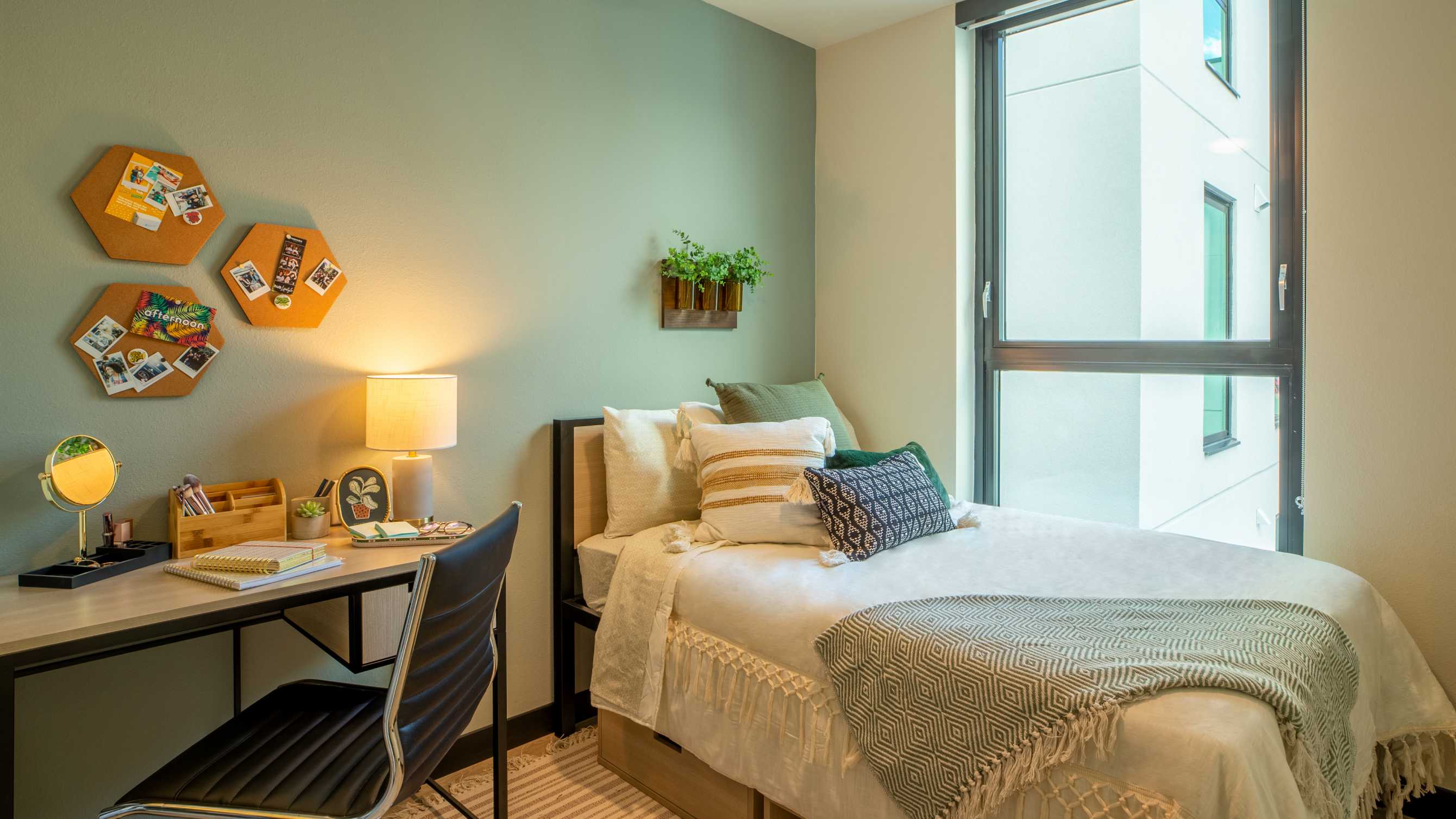 Bedroom with a white bed and desk