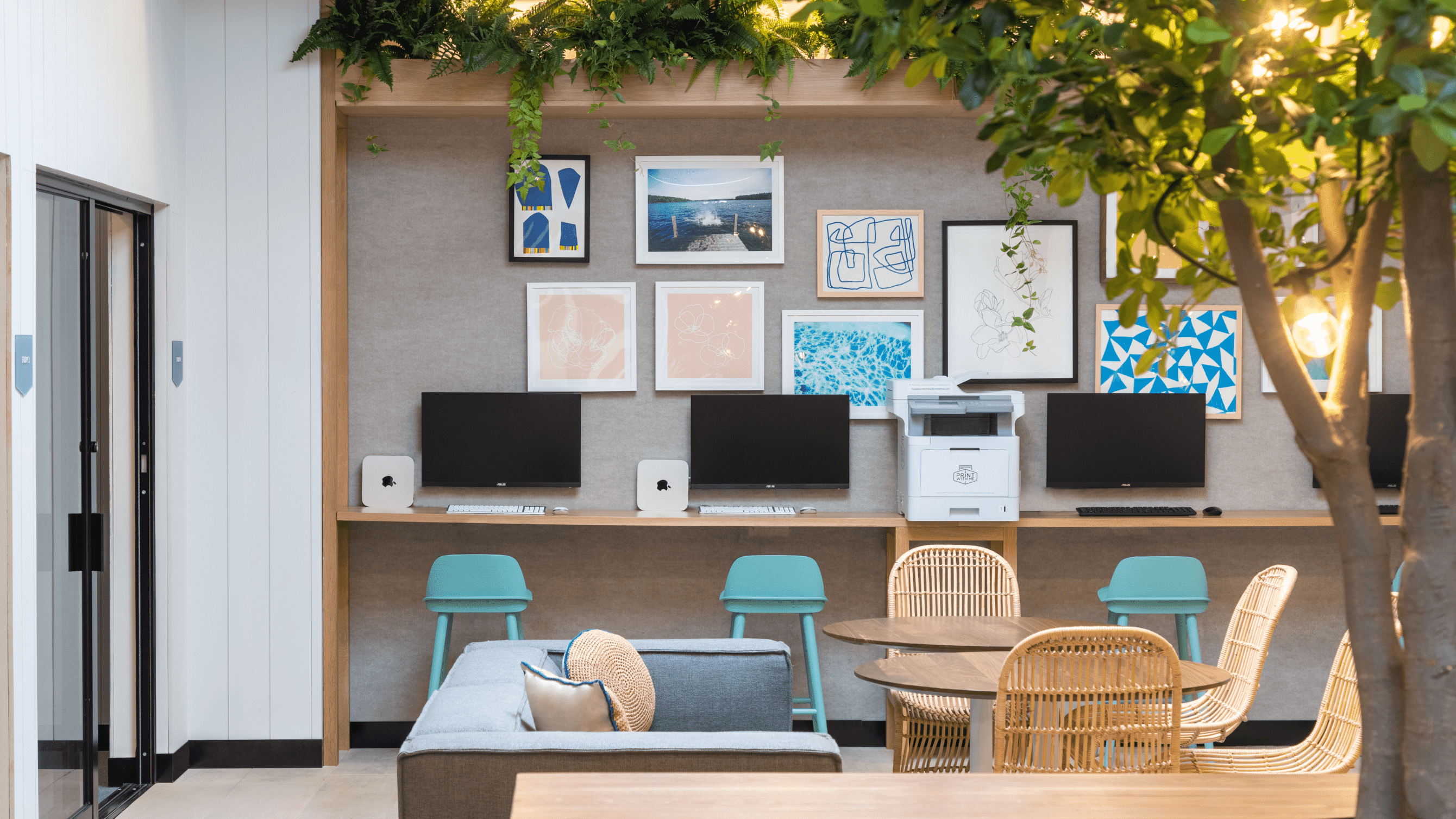 Study room with computers and blue chairs