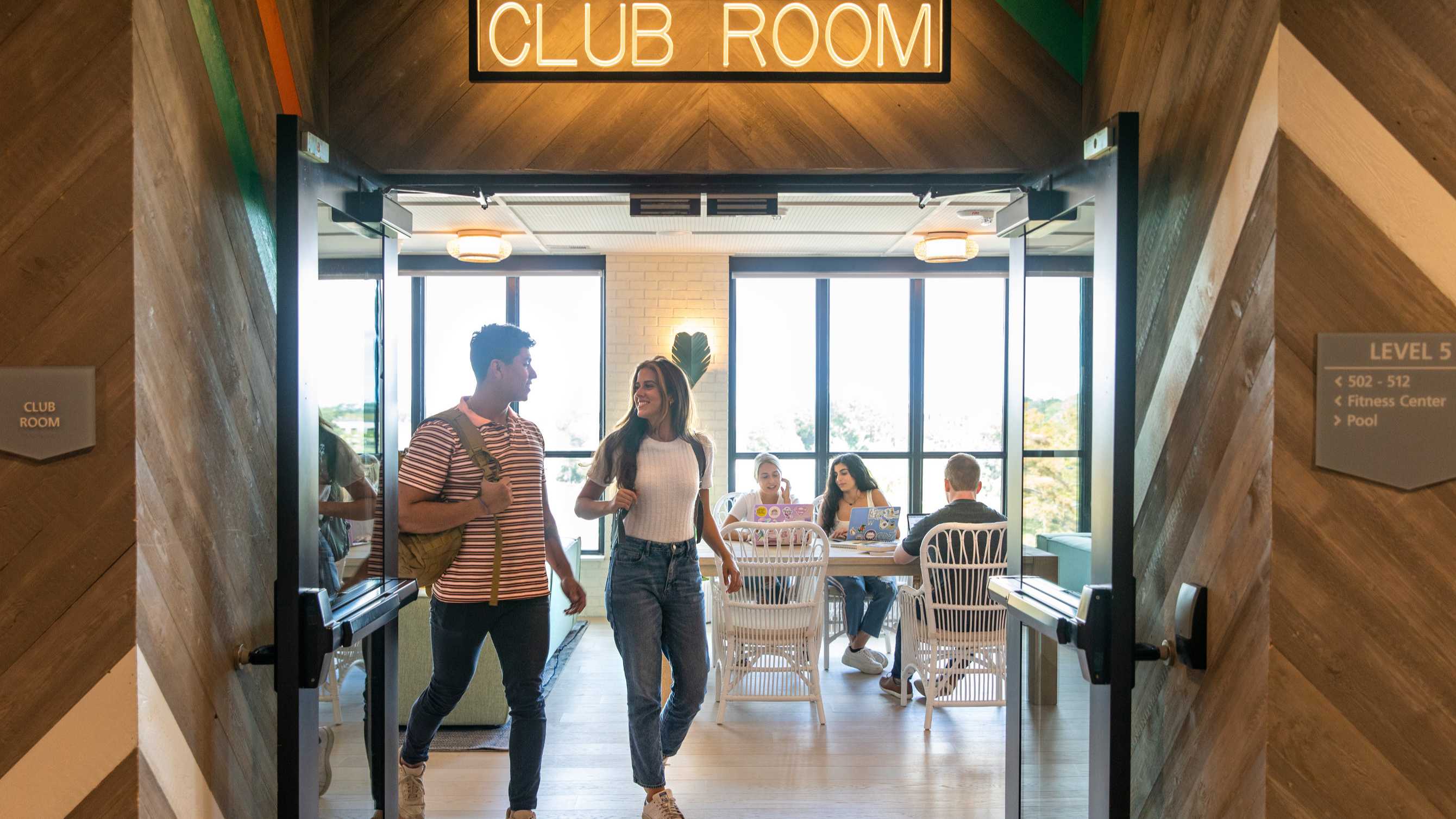 people leaving hub gainesville university's club room