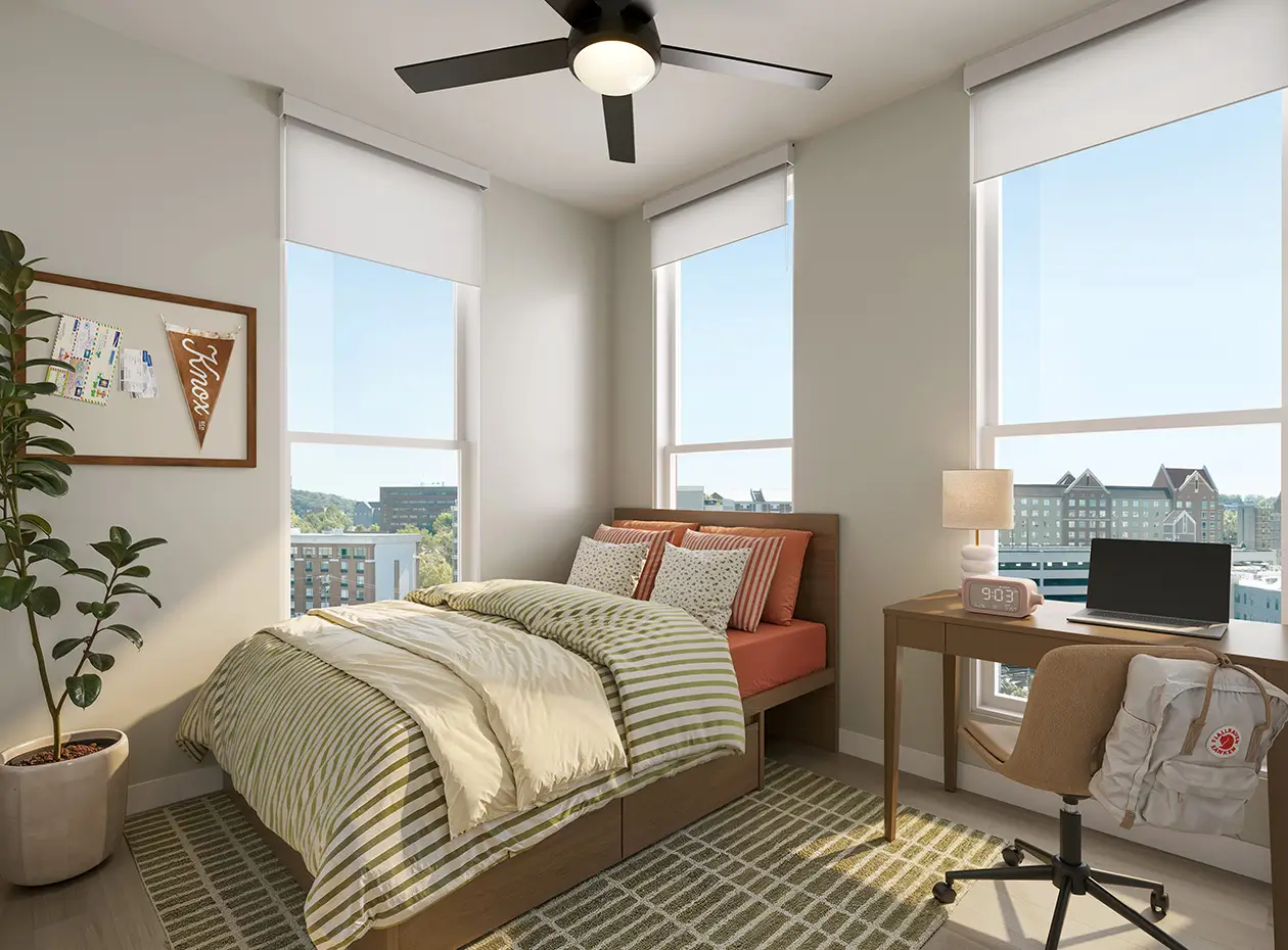 Fully furnished room with bed, desk and chair