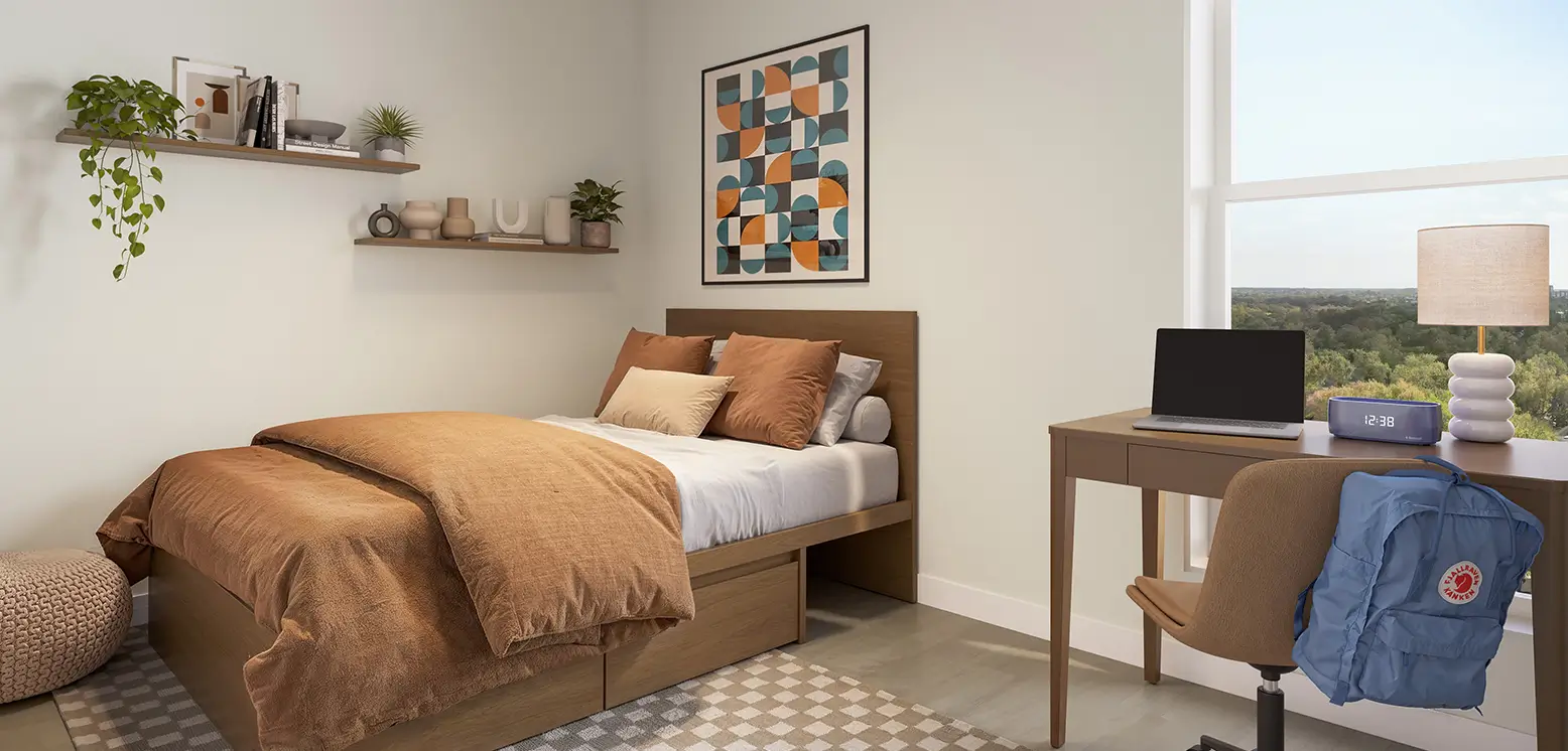 Fully furnished room with bed, desk and chair