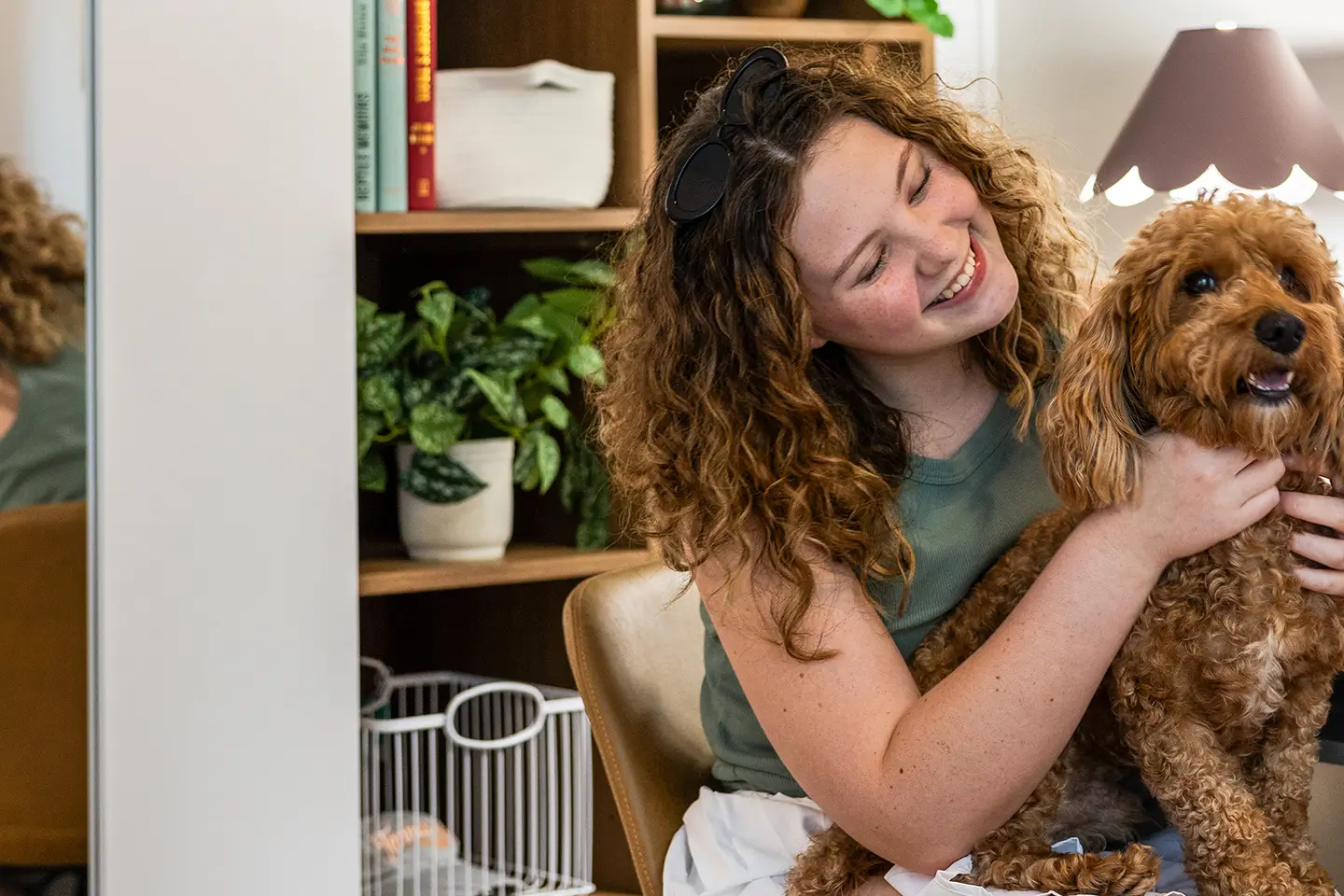 woman holding a pet