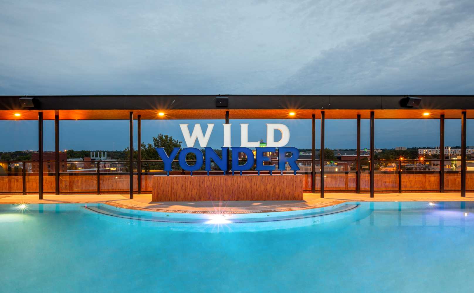 A poolside sign reading