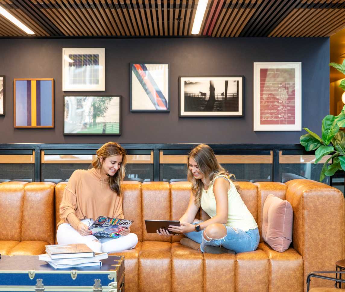 Two friends sitting on a couch