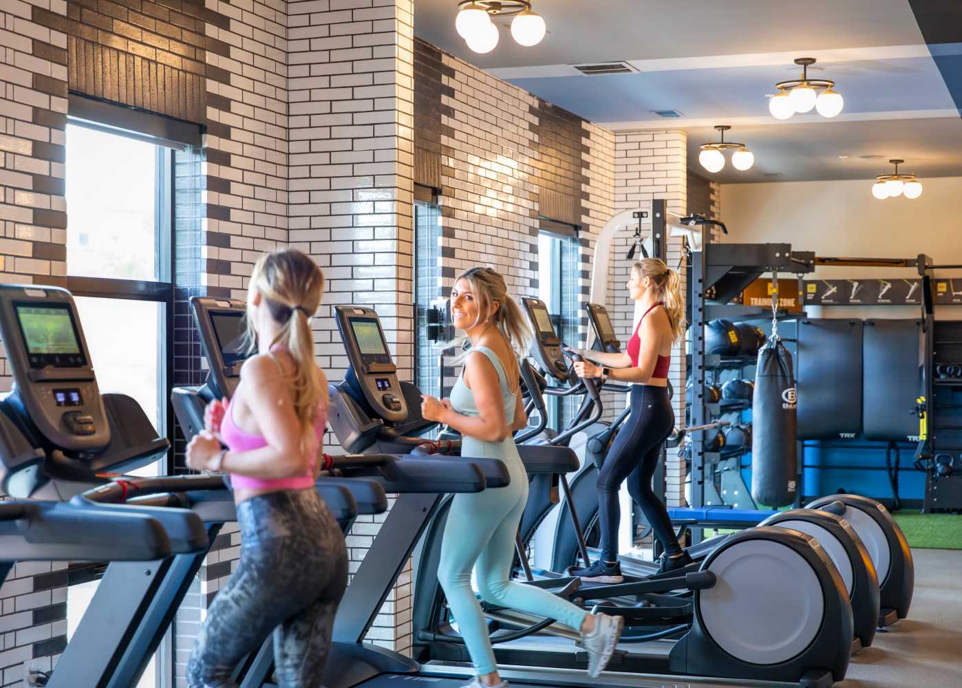 Friends working out in a fitness center