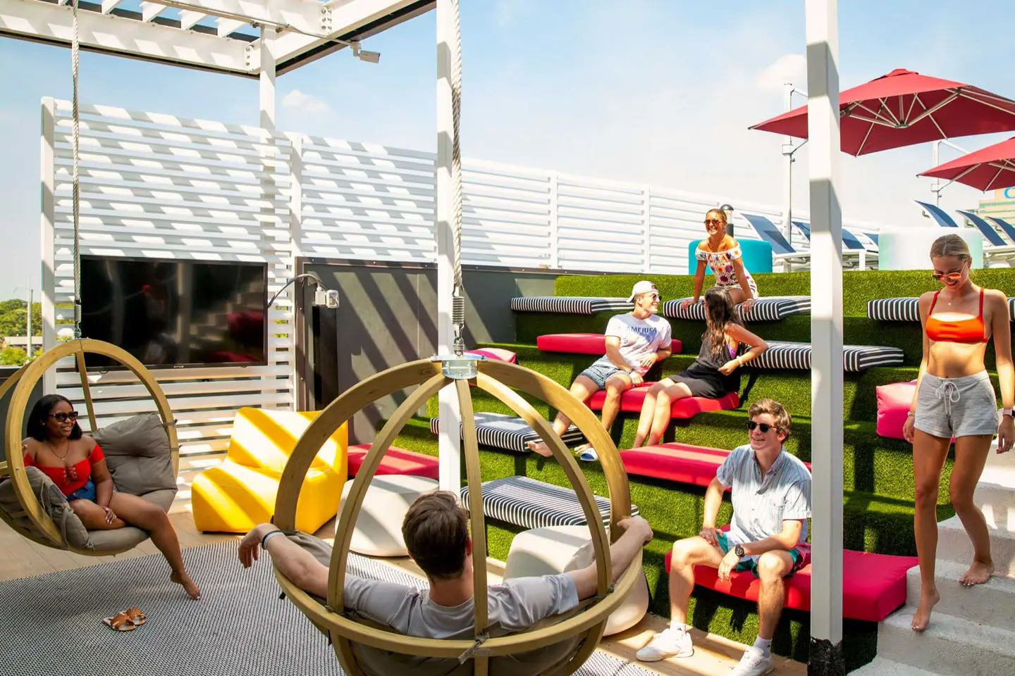 young adults hanging out in the outdoor courtyard