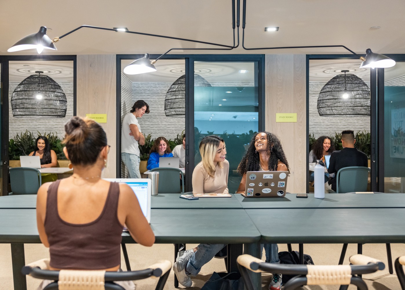 A group of friends studying at a table