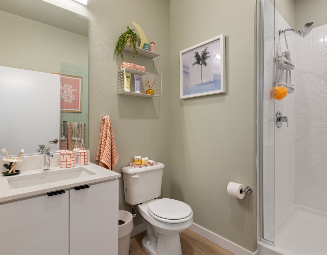 A bathroom with green walls