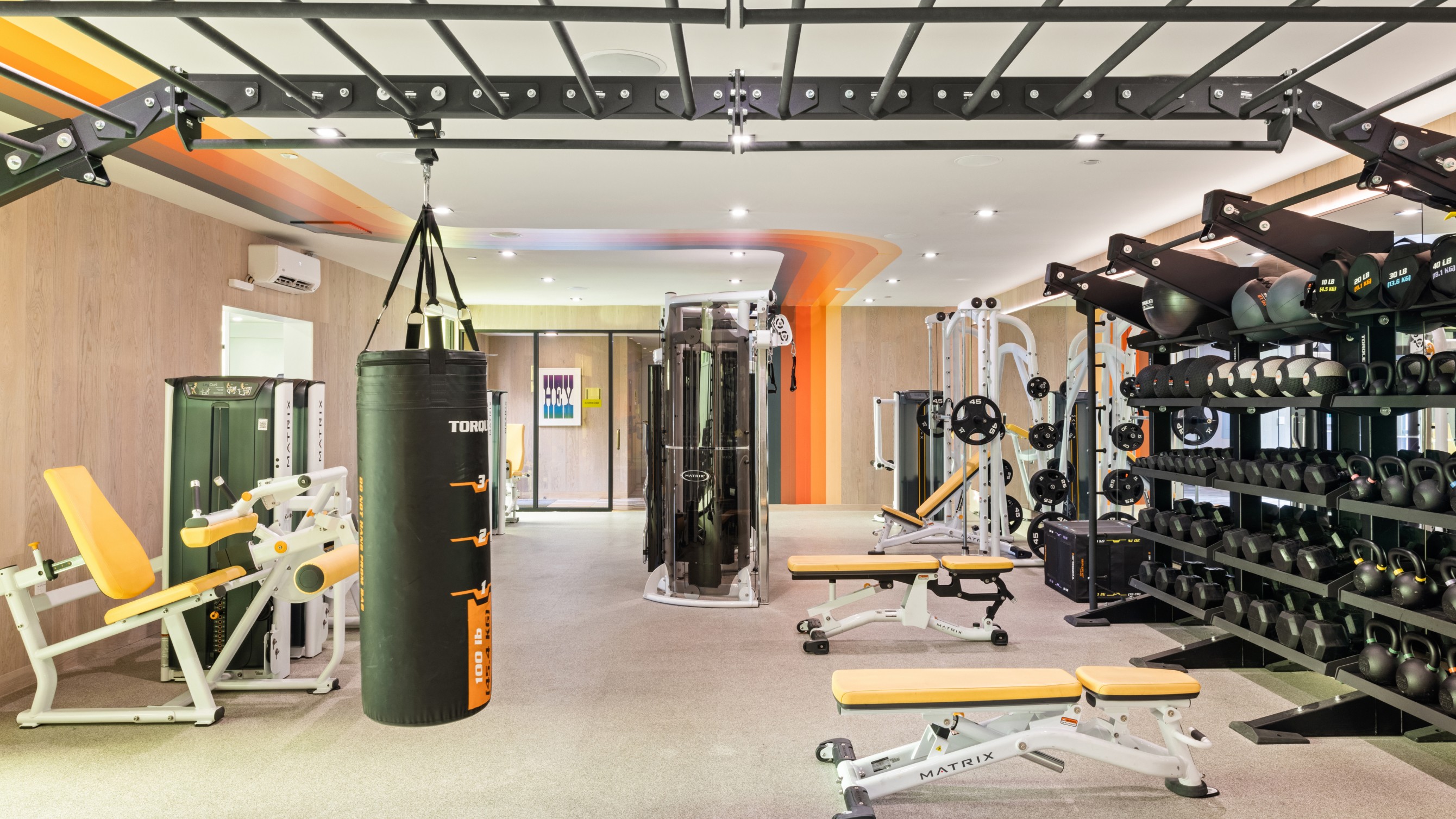 Fitness center with weights and a punching bag