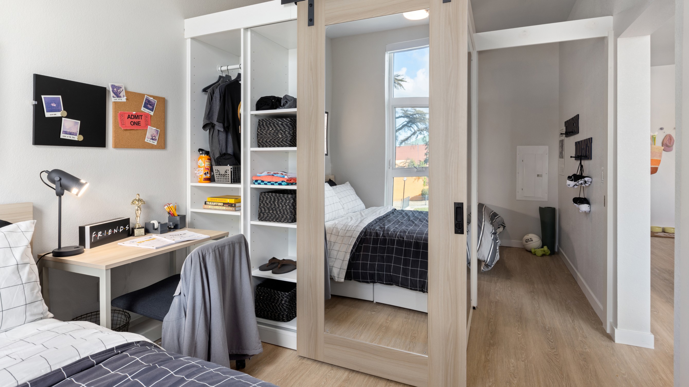 A bedroom with closet storage