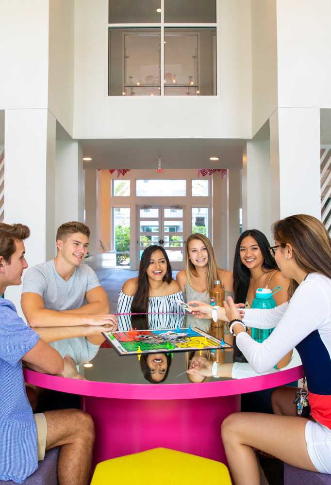 A group of friends playing a board game