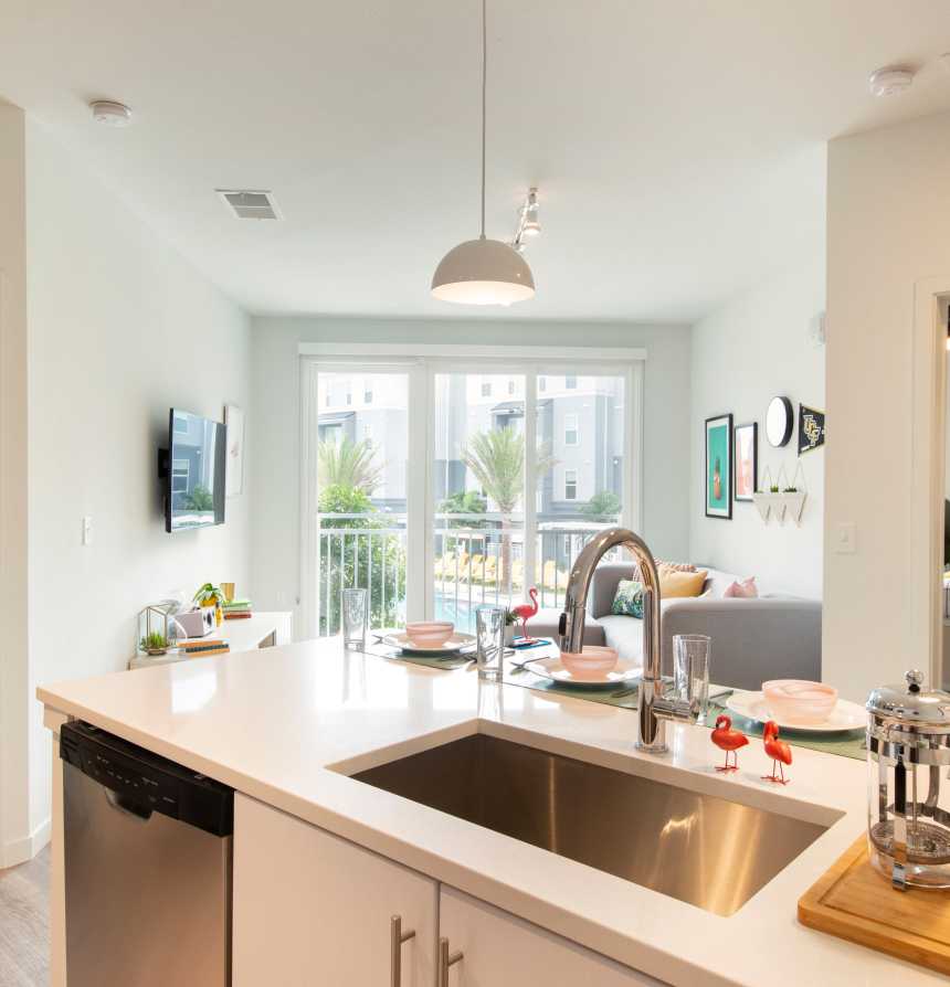 Kitchen with white cabinets and a dishwasher