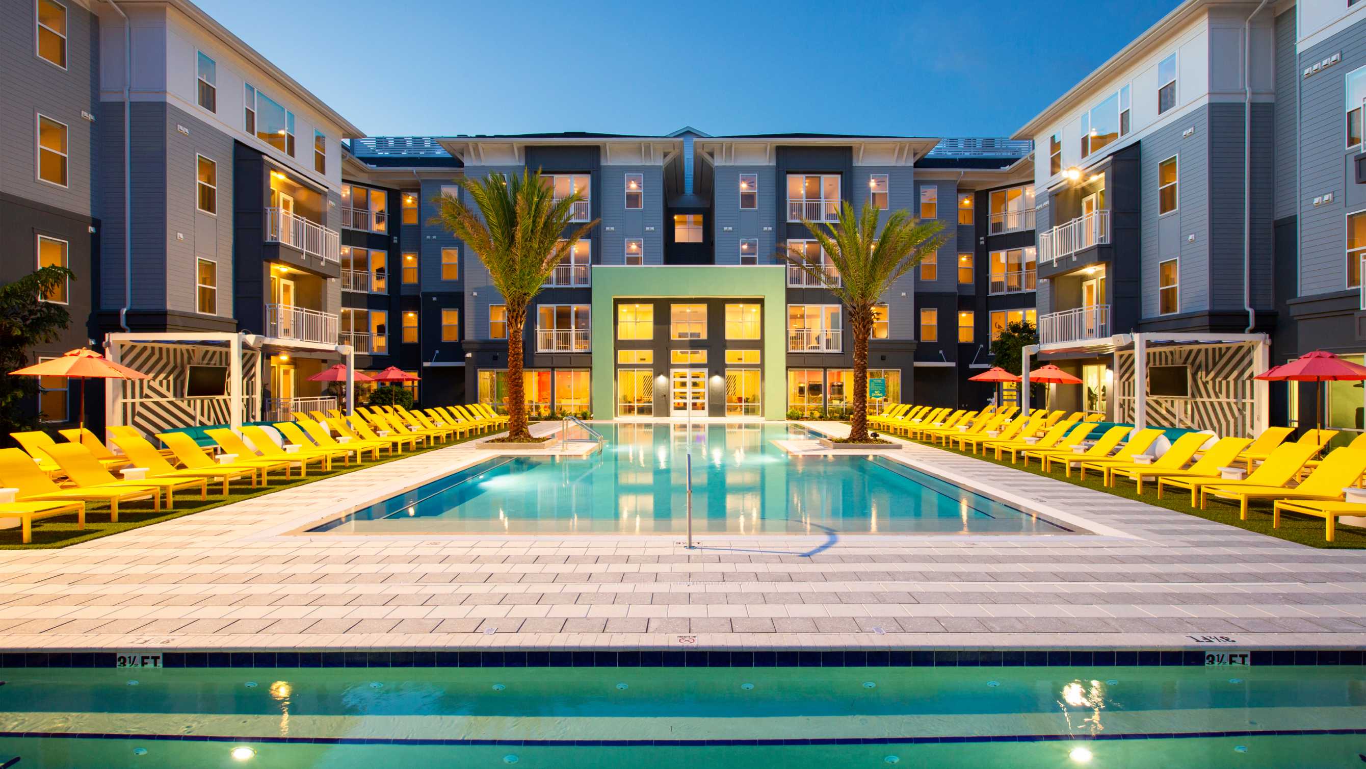 Rectangular swimming pool at nighttime