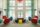 A common area with an orange chandelier