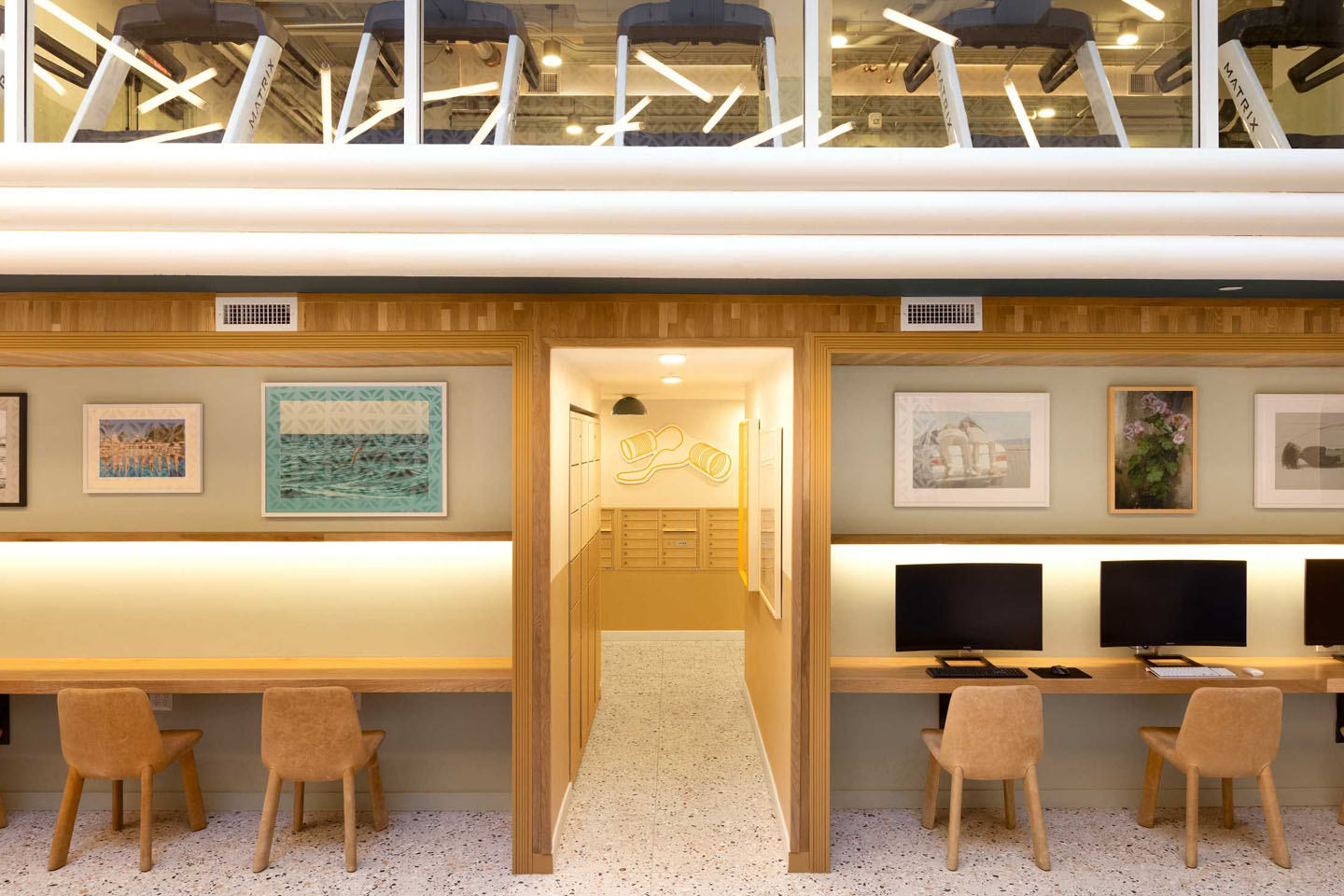 Room with computer desks and seats.