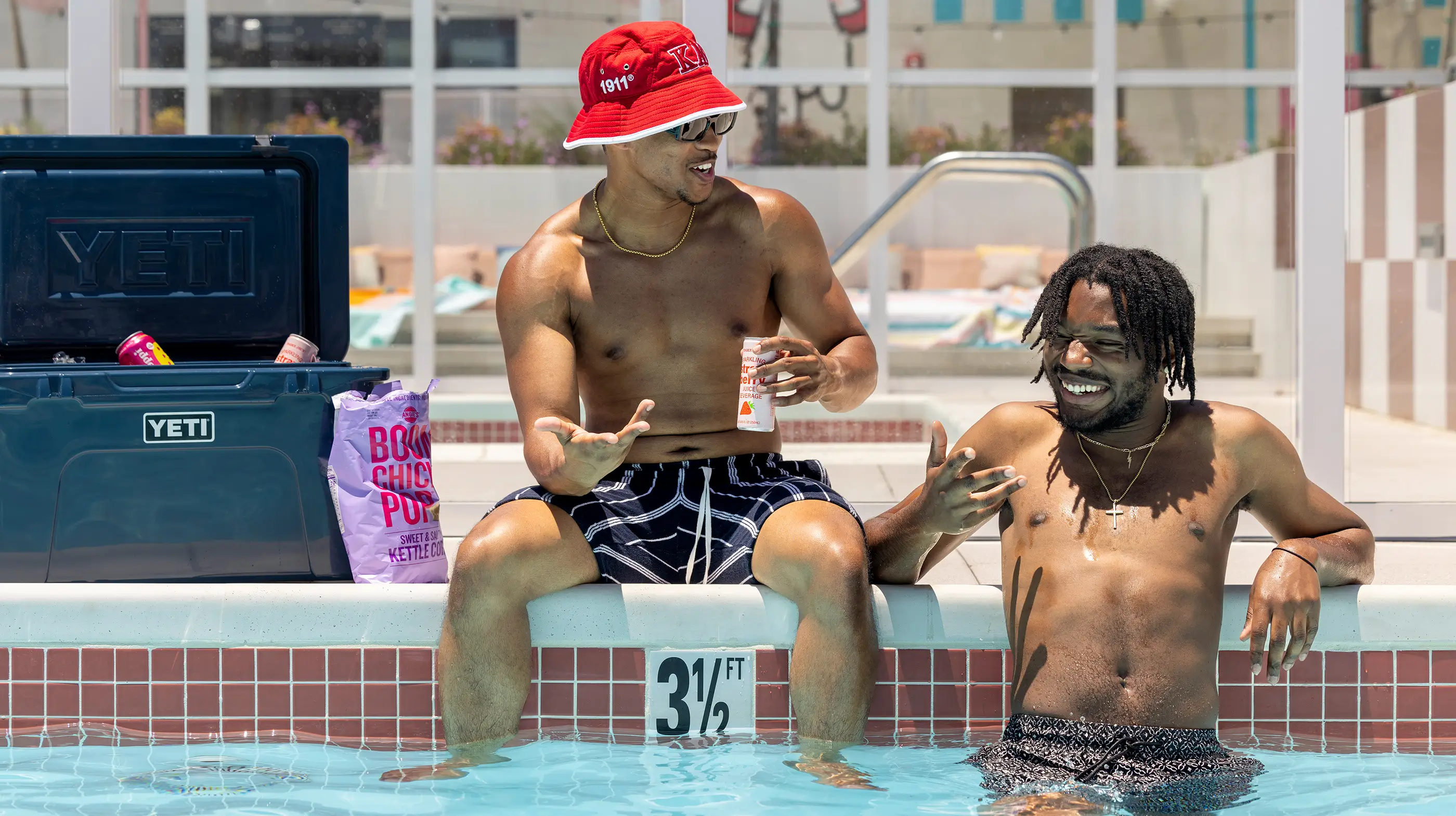 two friends in a swimming pool
