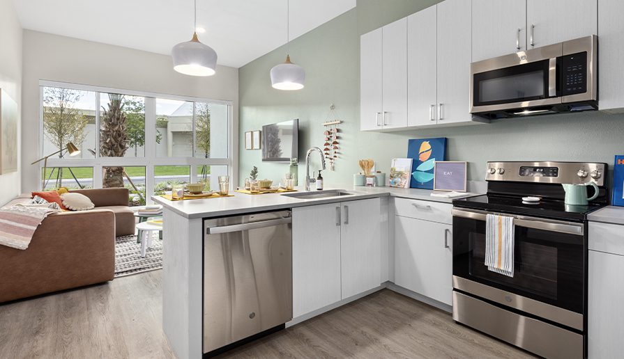 Furnished kitchen with silver appliances