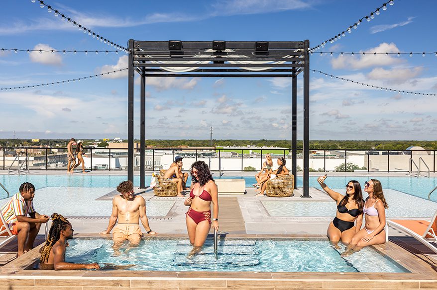 Young residents enjoying the pool