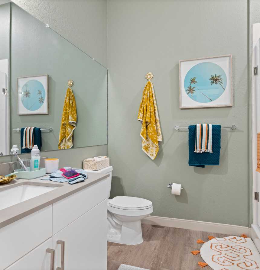 A bathroom with green walls