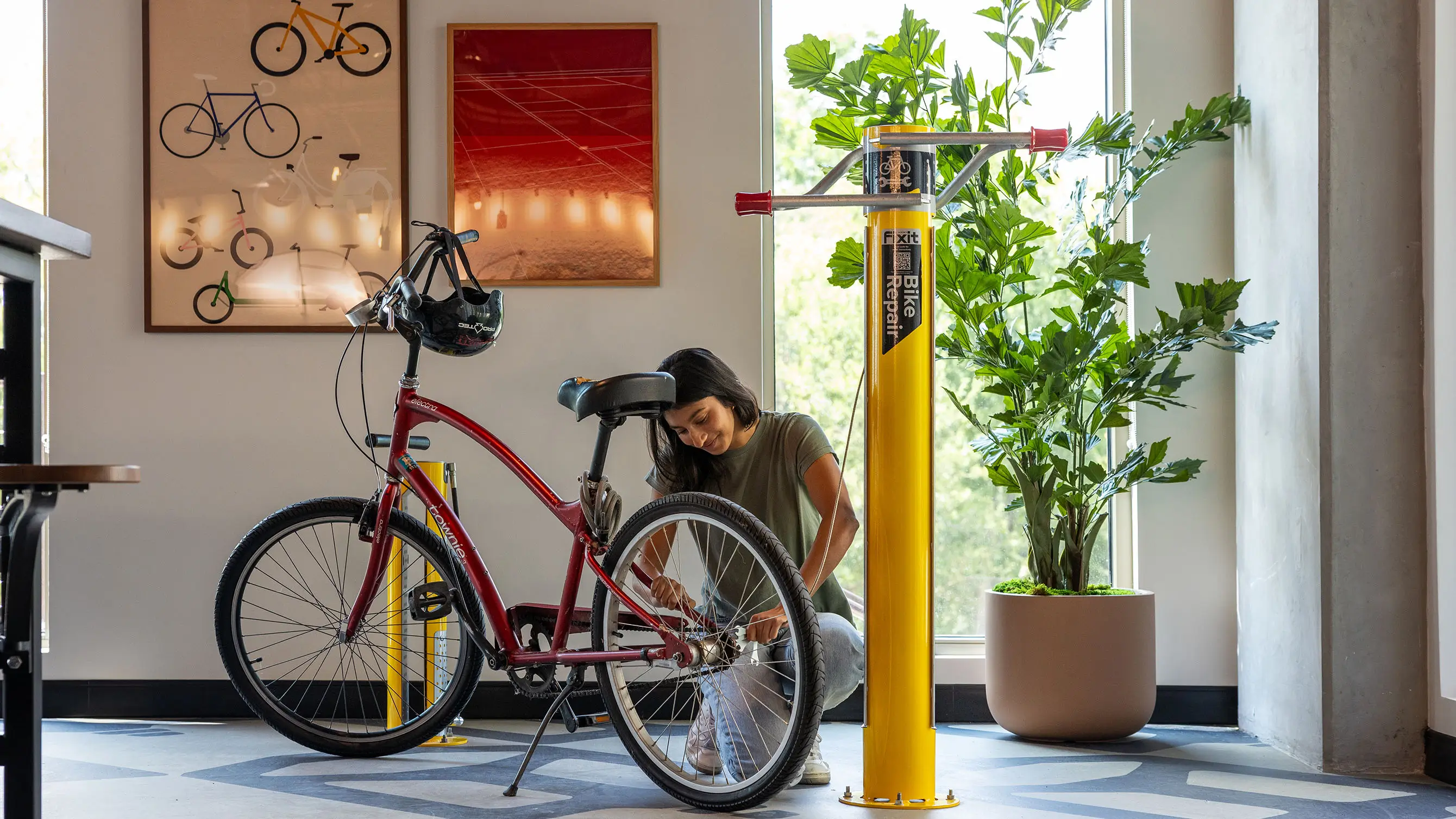 Resident with bicycle at Hub Tempe
