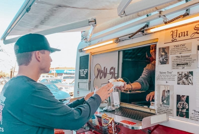 Man at Hotdog Stand