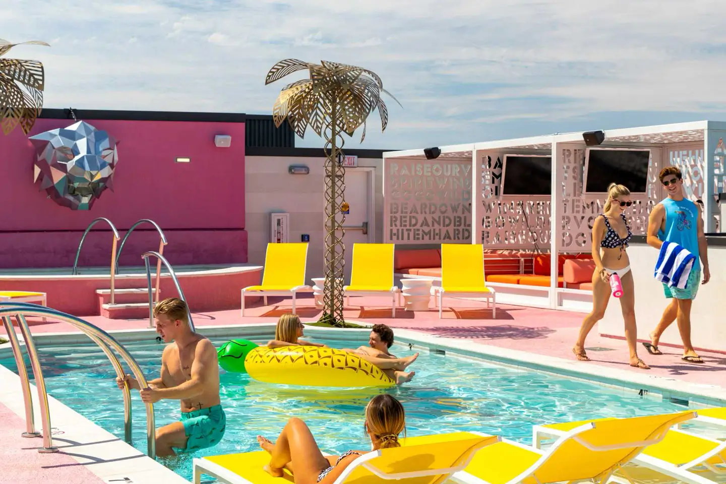 residents hanging out in the outdoor swimming pool
