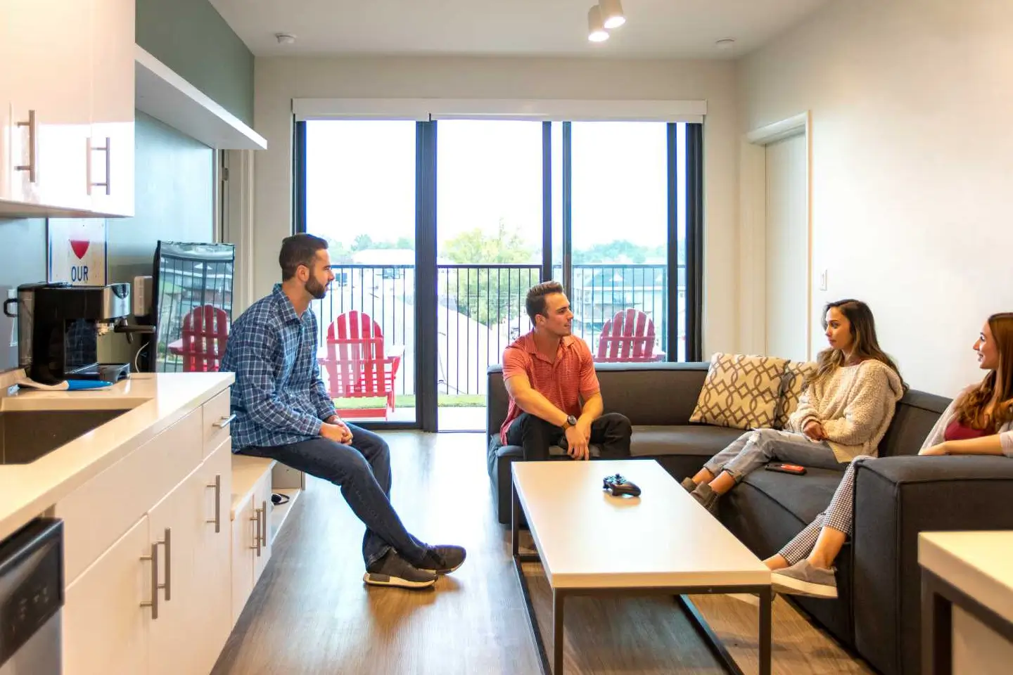 students conversating amongst each other on the couch