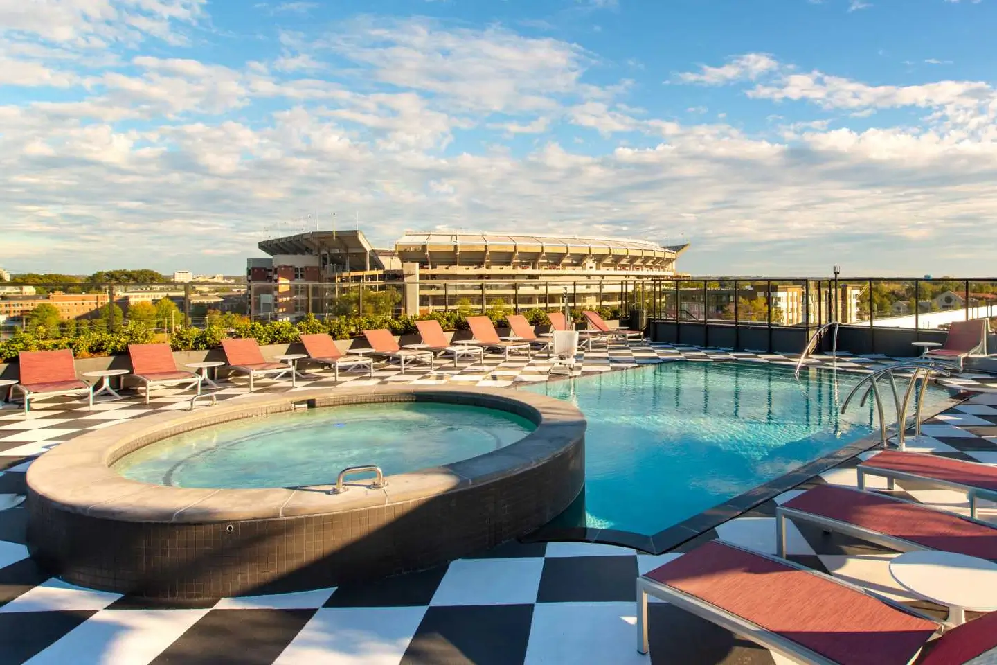 Rooftop pool at Hub Tuscaloosa overlooking Bryant-Denny Stadium