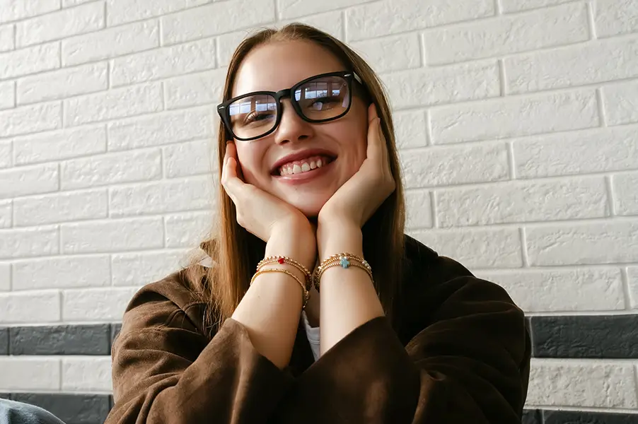 A young woman wearing headphones