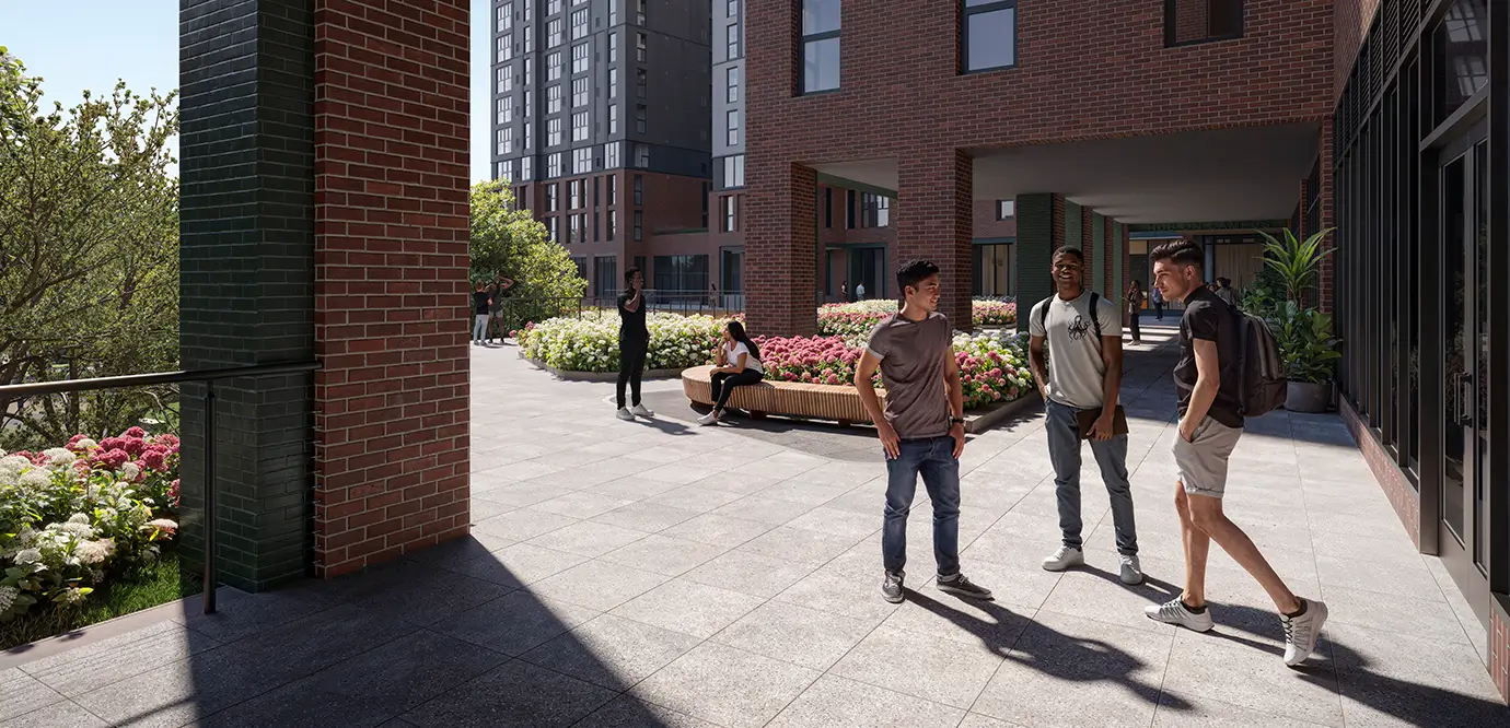 Young men talking outside a building