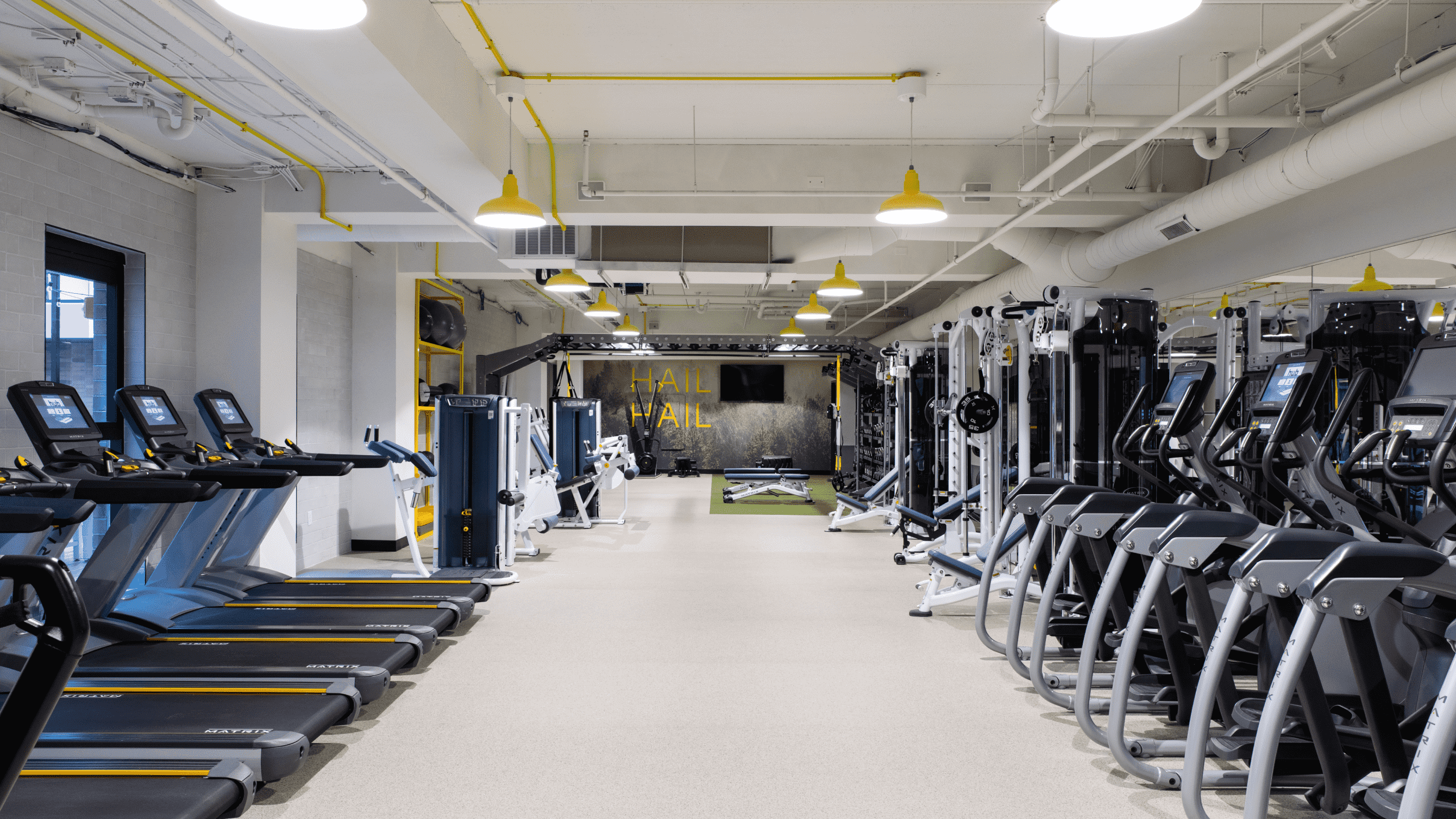 Fitness center filled with exercise equipment